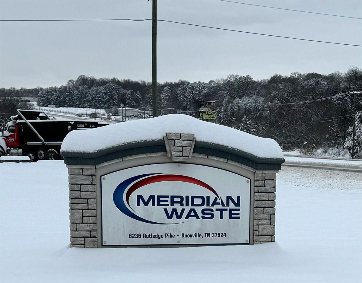 A Snow Capped Signs Stands Alone at Knoxville Hauling