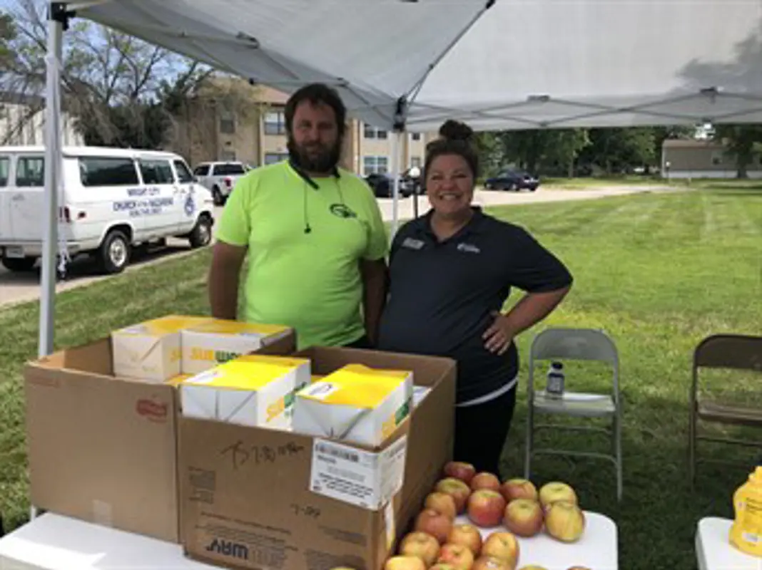 Meridian Waste volunteers Cody Nelson and Michelle Vohsen.