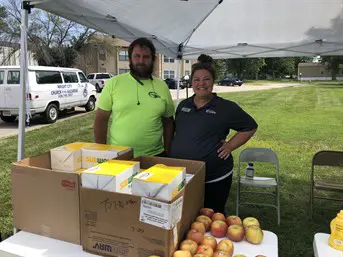 Meridian Waste volunteers Cody Nelson and Michelle Vohsen.